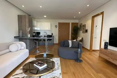 a living room with a couch and a table at Marvelous Ocean View Suite Marina - By AppartAli in Casablanca