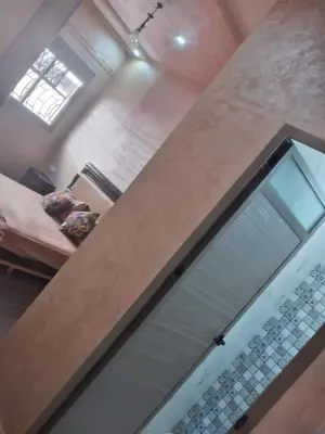 a room with a window and a door with a keyboard at Sweet Room Airport 5 in Deroua