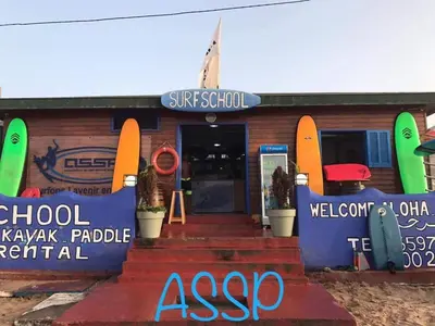 a building with surfboards on the front of it at chez mehdi in Skhirat