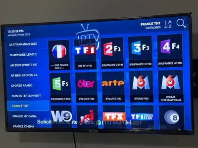 a television screen with different logos on it at Superbe Appt avec grande piscine 2 in Dar Bouazza