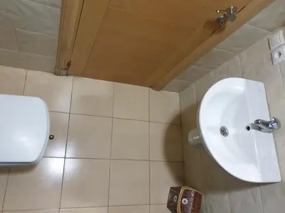 a bathroom with a sink and a toilet at Mosquée & Foire by Saloua in Casablanca