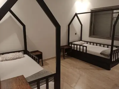 two bunk beds in a room with a window at Casa Fainna in Casablanca
