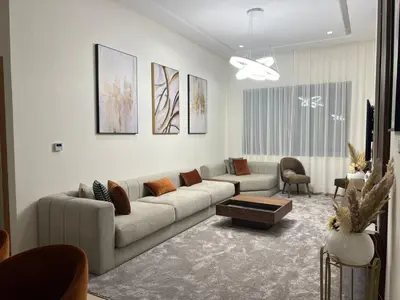 a living room with a couch and a table at Gorgeous 2 Bedrooms Apartment in Bourgogne in Casablanca