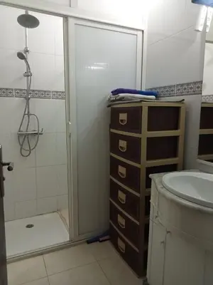 a bathroom with a shower and a sink and a toilet at Maison indépendante 100m2 à Témara centre in Temara