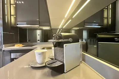 a coffee maker on a counter in a kitchen at Touch of Luxury - By AppartAli in Casablanca