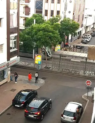 a group of cars parked on a city street at Mi mini estudio 1 in Rabat
