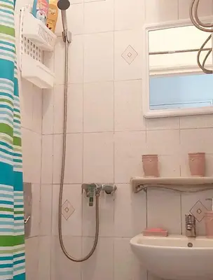 a bathroom with a shower and a sink at Mi mini estudio 1 in Rabat