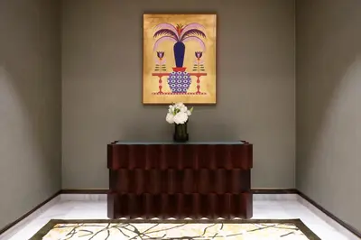 a vase of flowers on a table in a room at Four Seasons Hotel Rabat at Kasr Al Bahr in Rabat