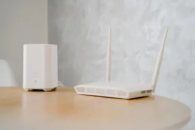 a white laptop computer sitting on top of a table at Luxurious Close to all attractions in Casablanca