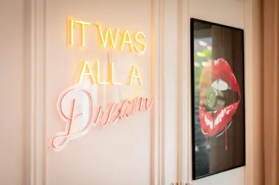 a sign that says it was all a dream on a door at Appartement Duplex G1 in Casablanca