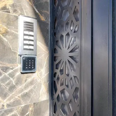 a door with a laser cut design on it at Appart relax aéroport 5 min in Nouaceur