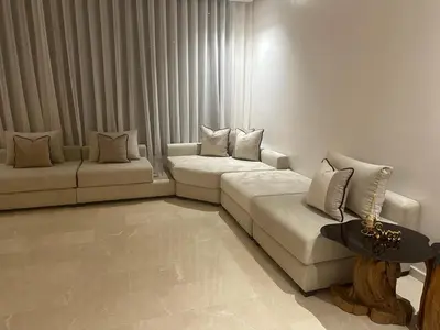 a living room with two couches and a table at Luxury Villa Jack Beach Resort Ocean Oasis View Panoramic in Casablanca