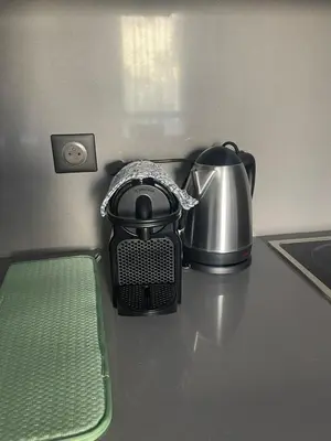 a tea kettle and a tea pot on a counter at Magic Appartement Luxury Gauthier 10 in Casablanca