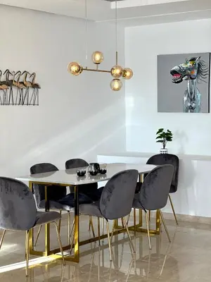 a dining room with a table and chairs at Marvelous Center Spot - 3 Bedrooms in Casablanca