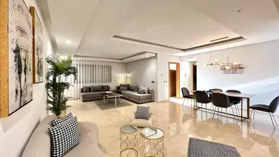 a living room with a couch and a table at Family 3 Bedrooms- By AppartAli in Casablanca