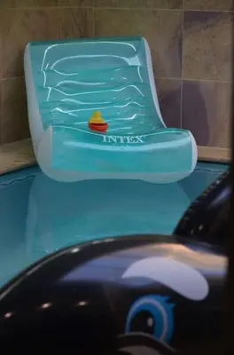 a bath tub with a sink and a faucet at Nassali - Luxurious Beachfront Villa with Private Pool in Casablanca