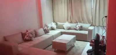 a living room with a couch and a table at Studio Zenith in Casablanca