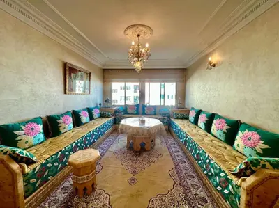 a large living room with a couch and a table at CASA Ghandi Central Apart 1Ch salon in Casablanca