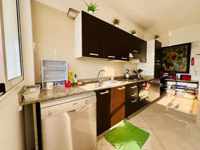 a kitchen with a sink and a counter top at Rabat Agdal Pearl - 2BR Spacious & Well located in Rabat