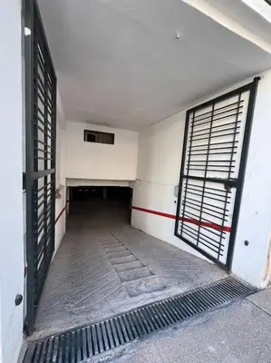 an empty hallway of a building with two doors at Rabat Agdal Pearl - 2BR Spacious & Well located in Rabat