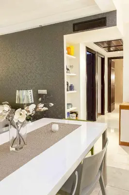 a kitchen with a white counter top in a room at Luxurious apartment, European Quality in Casablanca