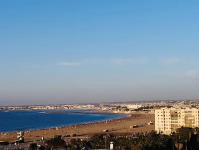 a view of a beach with buildings and the ocean at Mohammedia Relax in Mohammedia