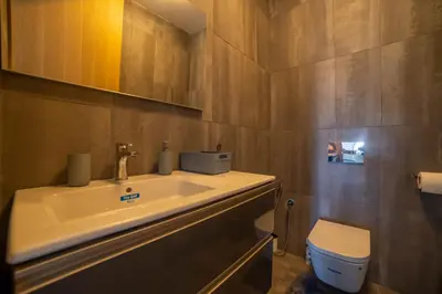 a bathroom with a sink and a toilet at Magnifique oasis de détente ! in Bouznika
