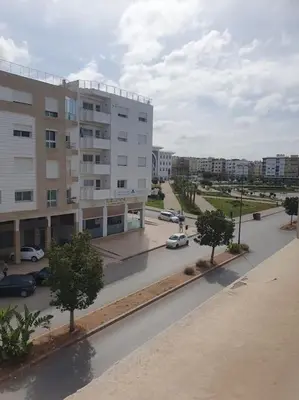a view of a city street with a building at Appartement spacieux, exceptionnel in Temara