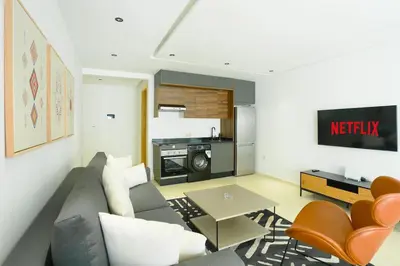 a living room with a couch and a table at Serenity in Casablanca