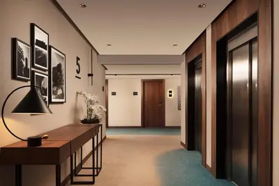a hallway with a long desk and a hallway with a door at Courtyard by Marriott Casablanca Downtown in Casablanca