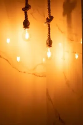 a group of lights hanging from a wall at Keyless Smart door/ New /Free parking/Central in Casablanca