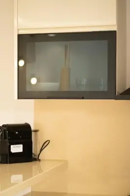 a black toaster sitting on top of a counter at Keyless Smart door/ New /Free parking/Central in Casablanca