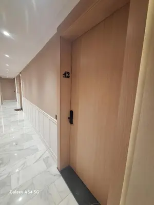 a hallway with a door with the number on it at Tribeca 3 - Casablanca Center in Casablanca