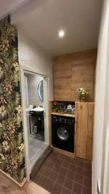 a laundry room with a washer and dryer in a house at Modern rez de villa, jack beach Tamaris, Dar Bouaza in Casablanca
