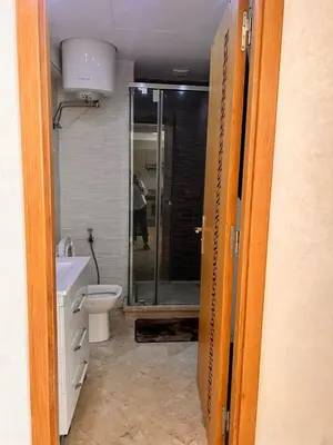a bathroom with a shower and a toilet at Studio Cosy Centre Ville Casablanca in Casablanca
