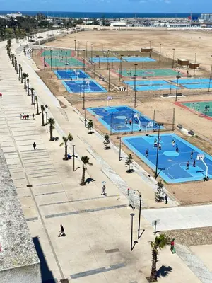 an overhead view of several pools in a beach at Appartement confortable au corniche in Mohammedia