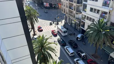 an aerial view of a city street with cars and palm trees at LUXE APPARTEMENT in Casablanca