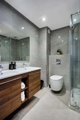 a bathroom with a sink and a toilet and a shower at Your Home Away from Home 2 Bed Flat With Parking in Casablanca