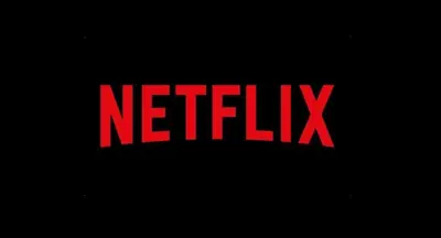 a red netflix logo on a black background at Luxury Maarif Anfa Racine in Casablanca