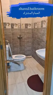 a bathroom with a toilet and a sink at Camping on the rooftop close to Casablanca Airport in Dah Hammou Ben Cheïkh