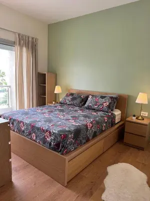 a bedroom with a bed and a window at My Cosy Place - Apartment 2BR - Piscine - Bahia Beach - Bouznika in Bouznika