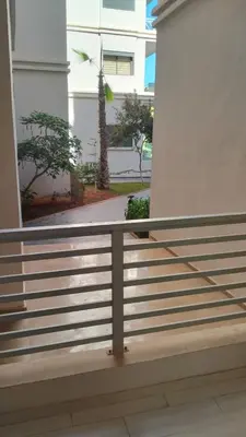 a balcony with a railing in a building at Vacances Soleil Piscine & Plage Bouznika in Bouznika
