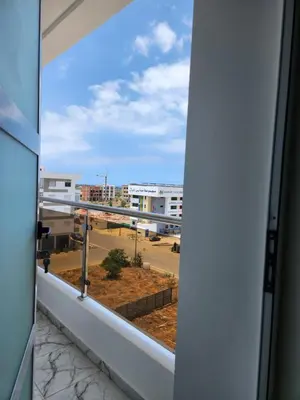 a view of a city from a balcony at Résidence Rose Marie 24 lot 92A à côté de Harhoura in El Harhoura