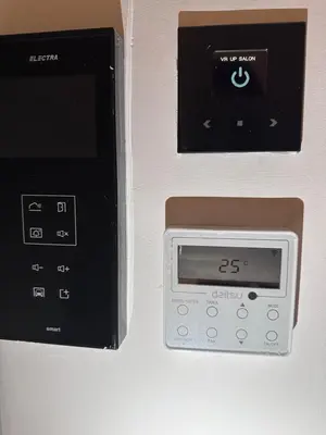 an alarm clock sitting on top of a wall at CFC Luxury View Appt Anfa park in Casablanca