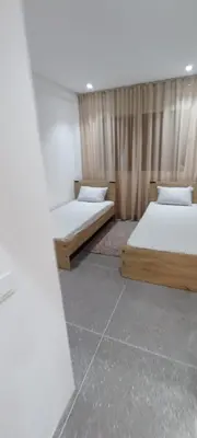 a room with two beds in a room at Appart RABAT AGDAL in Rabat