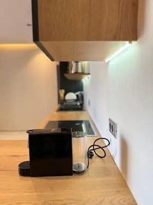 a microwave sitting on a counter in a kitchen at Classy presidential apartment in Casablanca