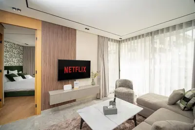 a living room with a couch and a bed at Le studio in Casablanca