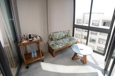 a living room with a couch and a table at Magnifique Studio neuf in Casablanca