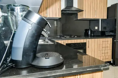 a mixer sitting on a counter in a kitchen at Le Joyau du Parc in Mohammedia