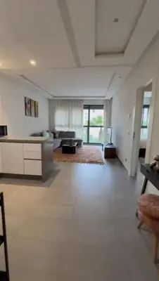 a large living room with white walls and white floors at Jasmine's house in Casablanca